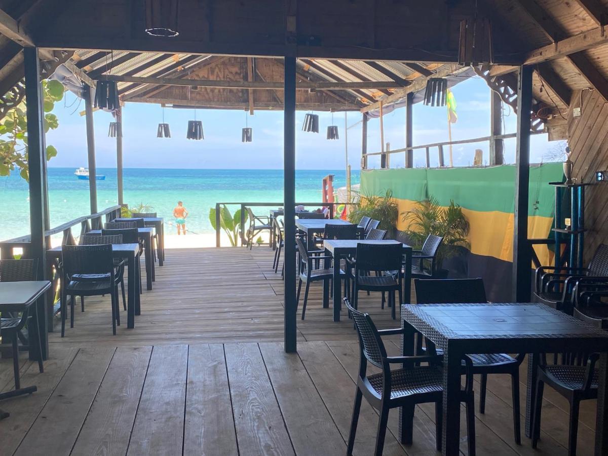 Secret Cabins At Firefly Beach Cottage ネグリル エクステリア 写真